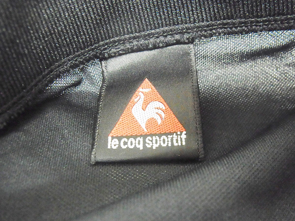 実際に弊社で買取させて頂いたルコックスポルティフ 名古屋グランパス ユニフォーム 2点SETの画像 2枚目