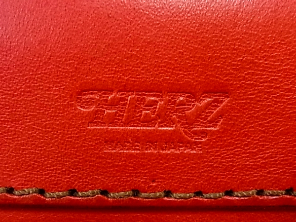 実際に弊社で買取させて頂いたHERZ/ヘルツ レザーミニショルダーポシェット/ポーチ レッドの画像 6枚目