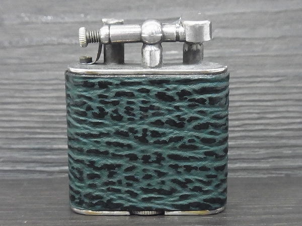 実際に弊社で買取させて頂いたダンヒル 革貼り ビンテージ 1920年代 ダブルホイールライターの画像 1枚目