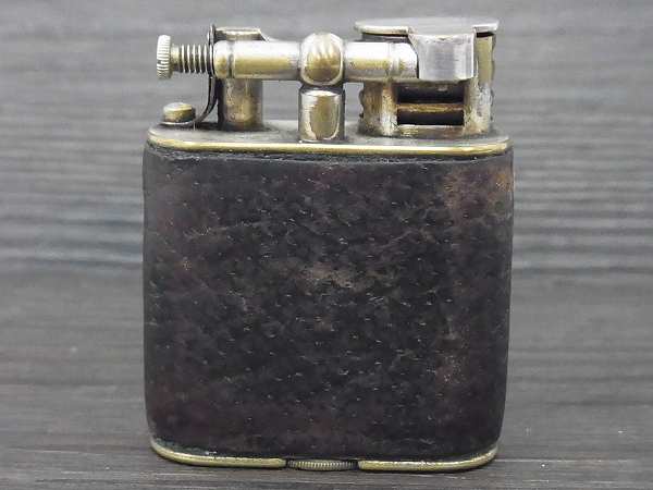 実際に弊社で買取させて頂いたdunhill ビンテージ 1920年代 革張り ダブルホイールライターの画像 1枚目