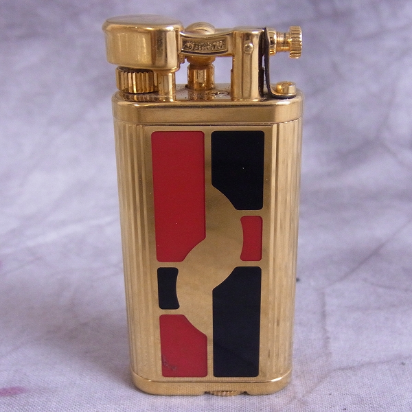 実際に弊社で買取させて頂いたdunhill/ダンヒル UNIQUE/ユニーク ガスライター 総柄の画像 1枚目