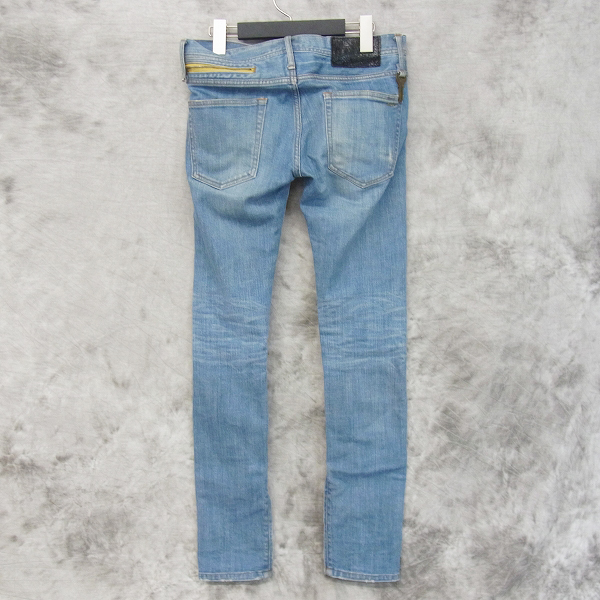 実際に弊社で買取させて頂いたMAD/ムーンエイジデビルメント 裾ZIP デニムパンツ インディゴ/00の画像 1枚目