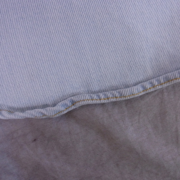 実際に弊社で買取させて頂いたGIVENCHY/ジバンシィ 16SS ダメージ加工 レザーポケット デニムジャケット XSの画像 9枚目