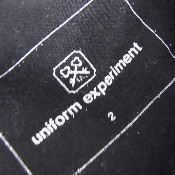 実際に弊社で買取させて頂いたUniform Experiment/ユニフォームエクスペリメント 16SS ペイントスプラッタープリントTシャツ 黒 UE-160053/2の画像 2枚目