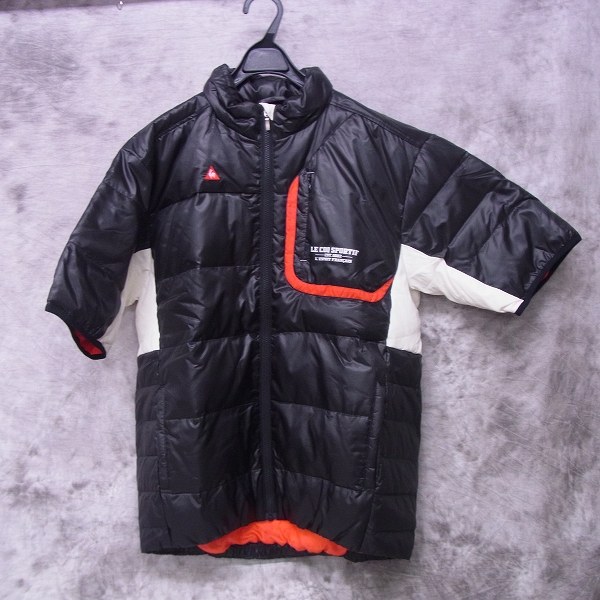 実際に弊社で買取させて頂いた【未使用】le coq sportif/ルコック ゴルフウェア アウターダウンジャケット 半袖 ブラック/LL
