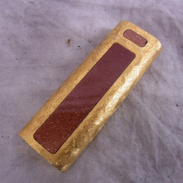 実際に弊社で買取させて頂いたCartier/カルティエ 金箔デザイン ガスライター 