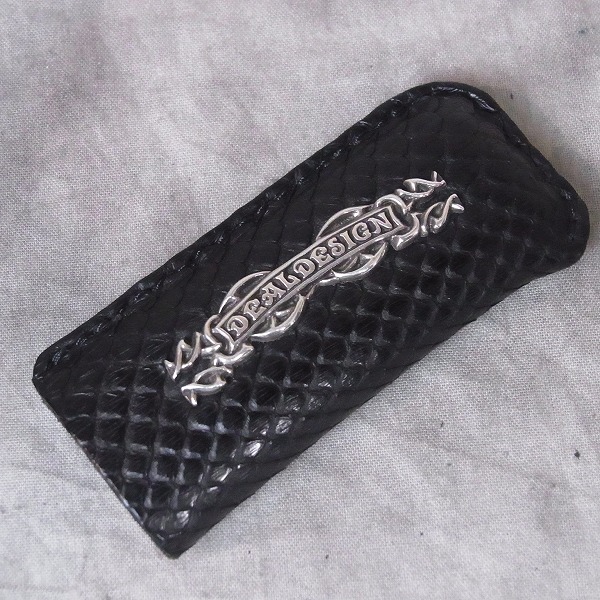 実際に弊社で買取させて頂いたDEAL DESIGN/ディールデザイン パイソン シルバーライターケース