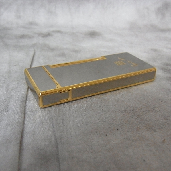 実際に弊社で買取させて頂いたGIVENCHY/ジバンシィ ローラーガスライター ゴールド×シルバーの画像 3枚目