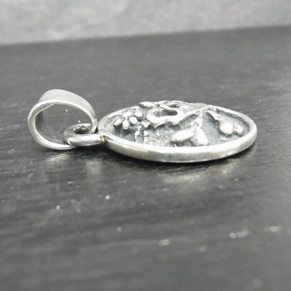 実際に弊社で買取させて頂いたTRAVIS WALKER/トラヴィスワーカー 2011ツアー限定ペンダント エングレ入デイジースカルの画像 2枚目