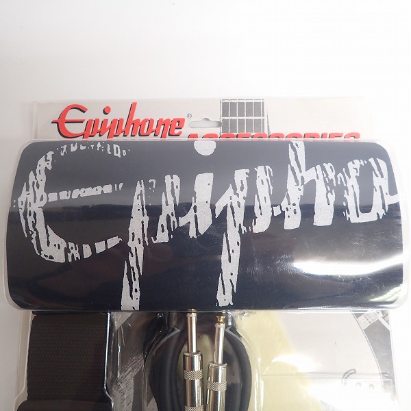 実際に弊社で買取させて頂いた★【未開封】Epiphone/エピフォン EPIPHONE GUITAR ACCESSORY KIT (ノベルティ Tシャツ ストラップ クロス etc.) E-ACCKIT1の画像 1枚目