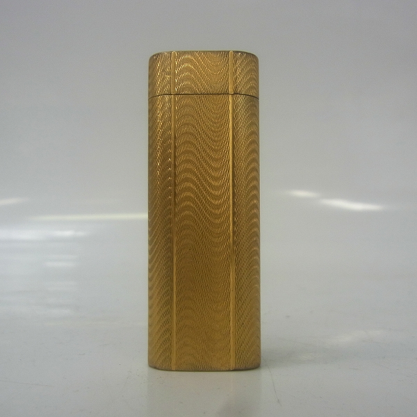 実際に弊社で買取させて頂いたCartier/カルティエ ガスライター ゴールドコーティング 波模様