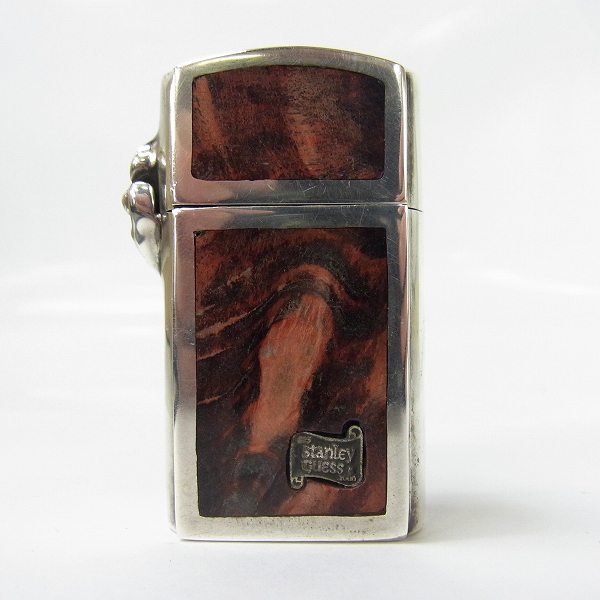 実際に弊社で買取させて頂いたSTANLEY GUESS/スタンリーゲス マルチスカル/ウッドインレイ スリム ジッポーの画像 1枚目