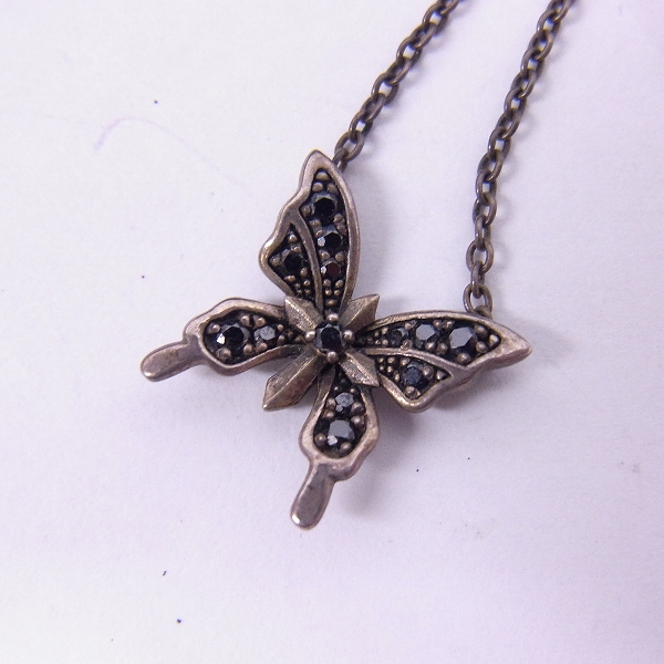 実際に弊社で買取させて頂いた【証明書】Justin Davis/ジャスティンデイビス Monarch Necklace/モナークネックレス SNJ495の画像 1枚目