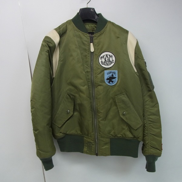 実際に弊社で買取させて頂いたSTUSSY×ALPHA×fragment design MA-1 フライトジャケット カーキ/M