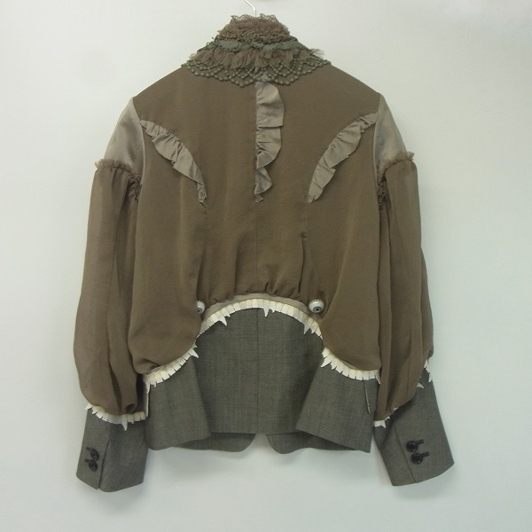 実際に弊社で買取させて頂いたUNDERCOVER/アンダーカバー  目玉ボタンデザインブラウスジャケット/1の画像 1枚目