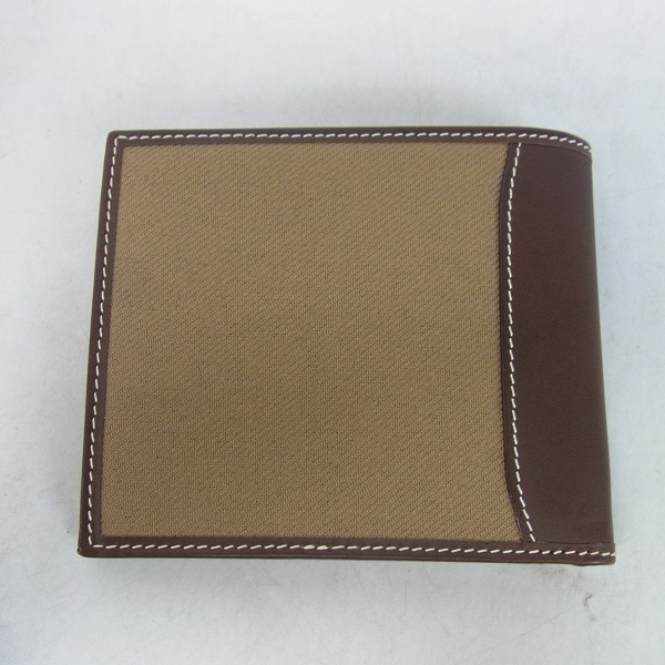 実際に弊社で買取させて頂いたHUNTING WORLD/ハンティングワールド キャンバス×レザー 二つ折り財布の画像 1枚目