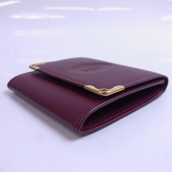 実際に弊社で買取させて頂いたCartier/カルティエ レザー コインケース 小銭入れ マストライン ロゴ ボルドー の画像 2枚目